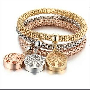 NWOT Stretchy Bracelet set with tree charm